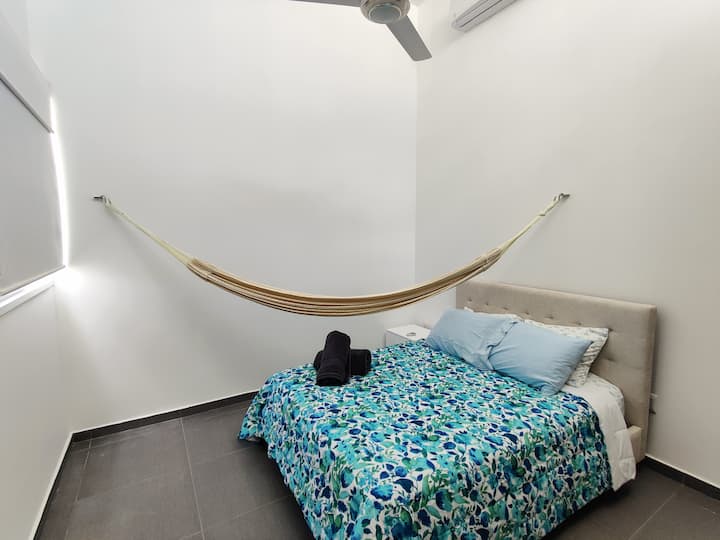 3rd bedroom, queen bed, hamock, A/c, ceiling fan, bathroom and closet