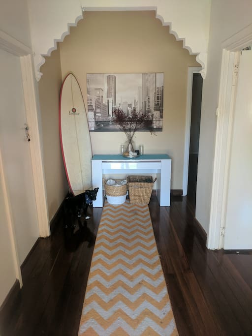 Entrance, bedroom door on left