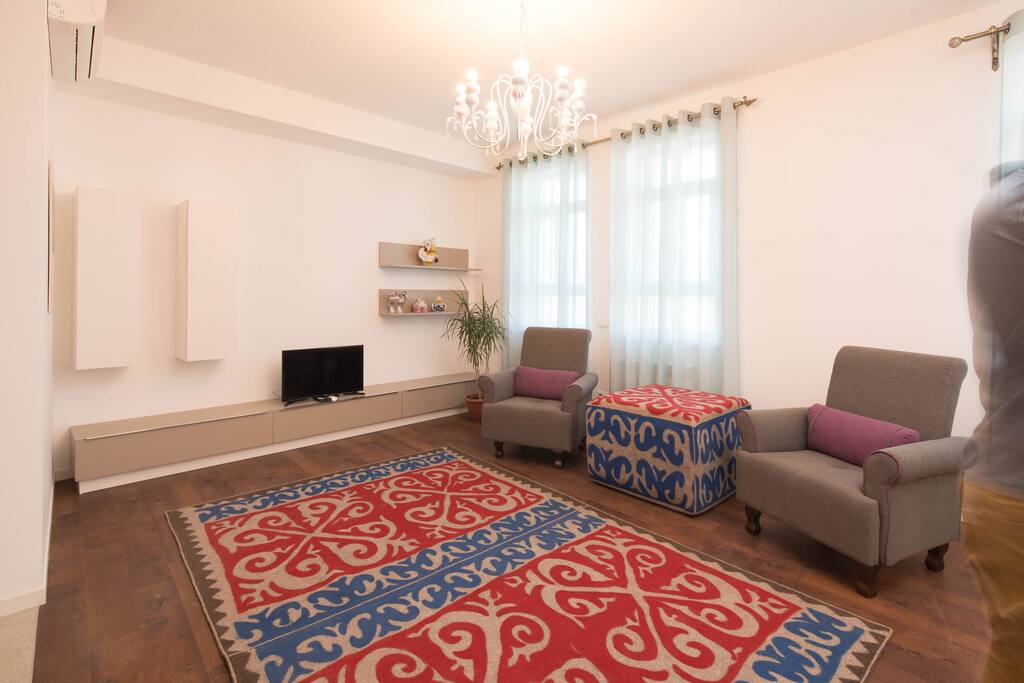 he living room, cozy, spacious, in light colors