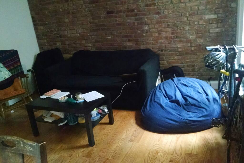 Cozy living room where you can hang out after a day of exploring the city.