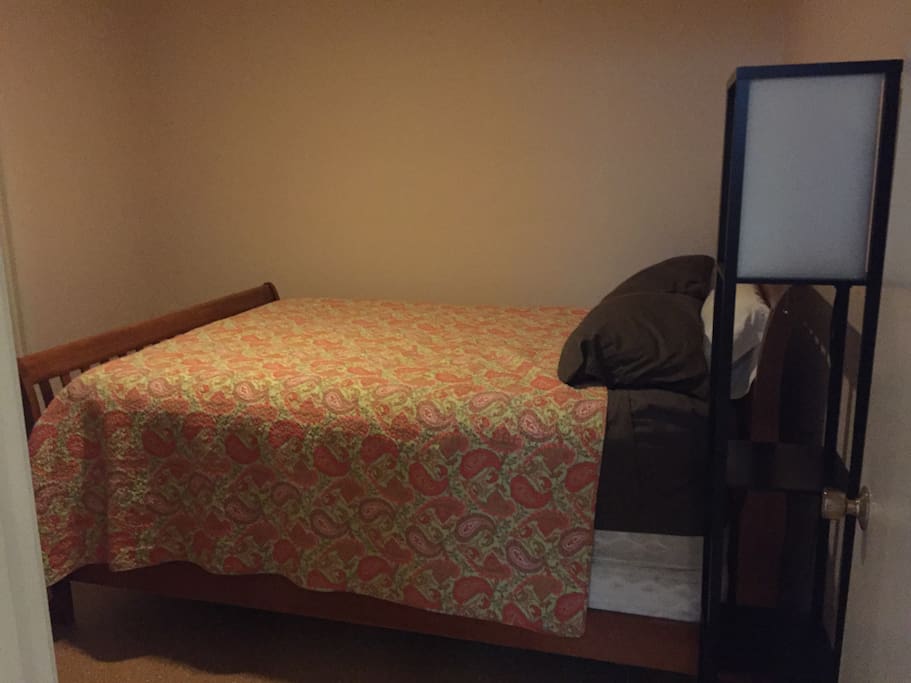 Queen bed in bedroom