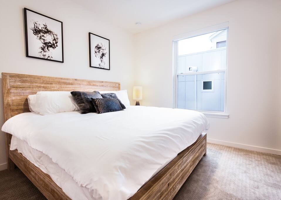 King bed with a super comfy mattress and cuddle quality blankets! Dive in!