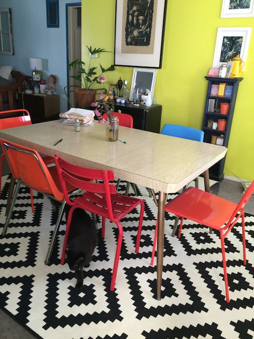 shared dining space, black house cat named frances.