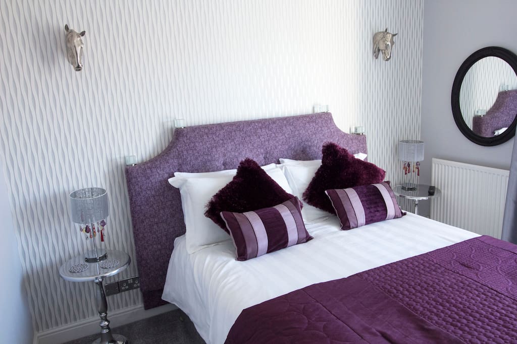 Ensuite Master bedroom - king bed overlooking canal