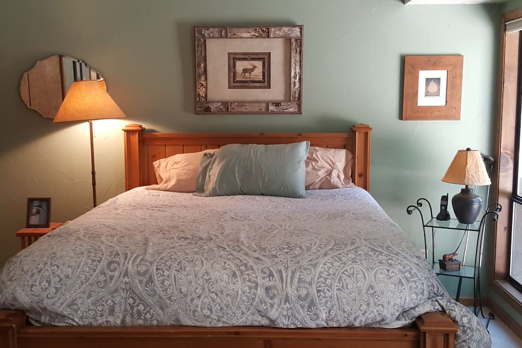 King size bed in the master bedroom