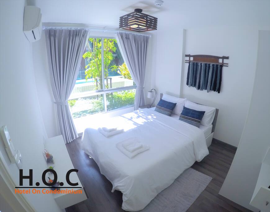 Bedroom with pool view