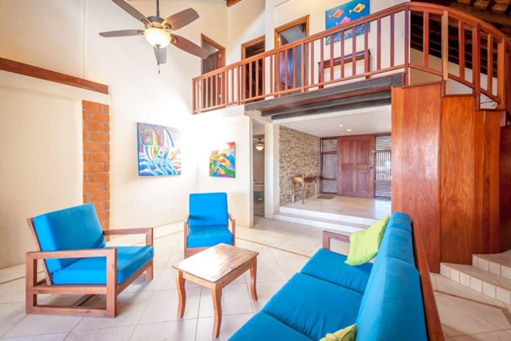 the main living area and view to upper two bedrooms