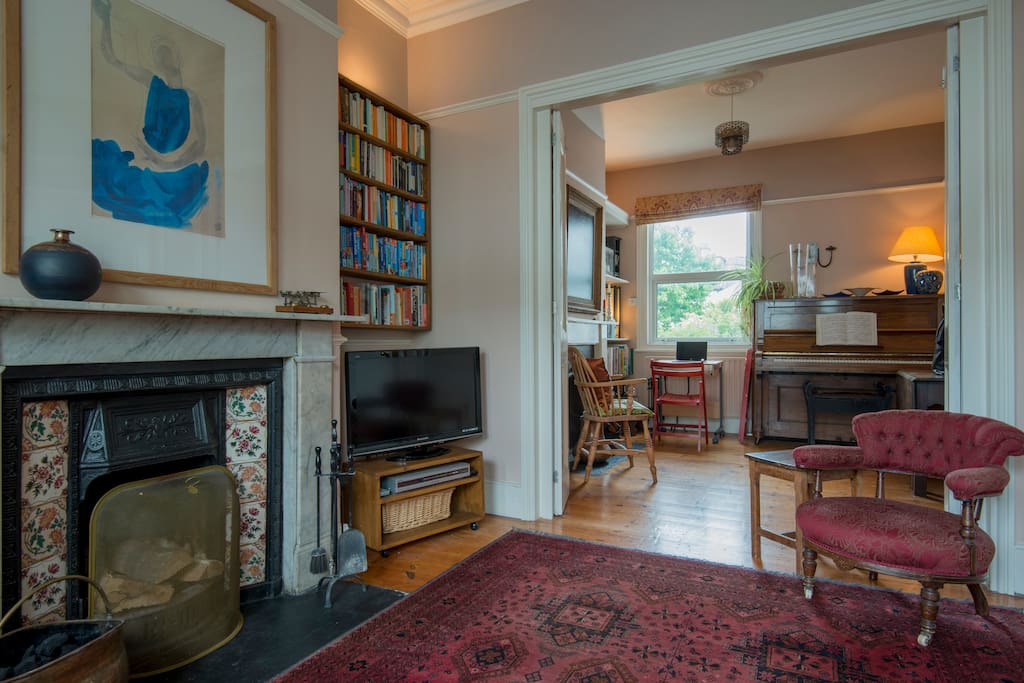 Living room / dining room with open fire and dividing doors