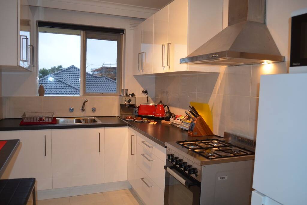 kitchen. coffee machine, kettle and toaster.