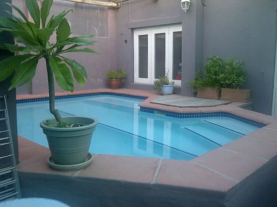 Sparkling pool area with secure garage/parking & remote access