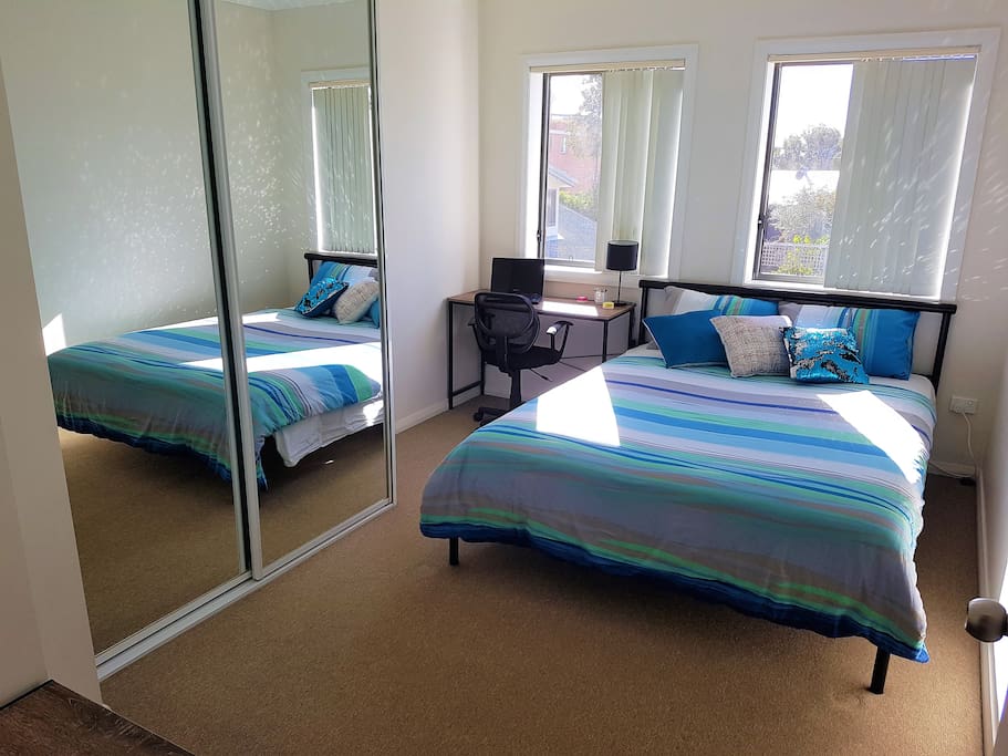 Private bedroom with shared bathroom