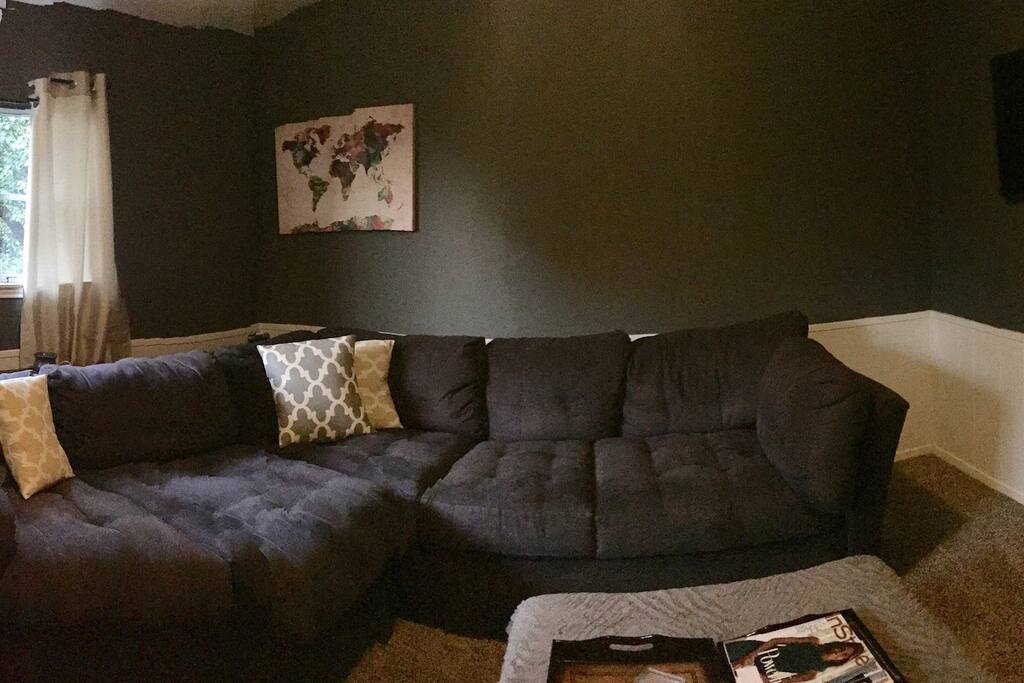 Comfortable living area with great treed view of neighborhood