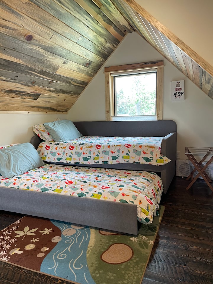 Trundle bed in loft.