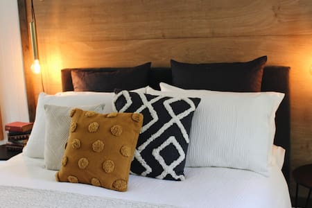 In the clean forest air, "The Art House Sassafras"