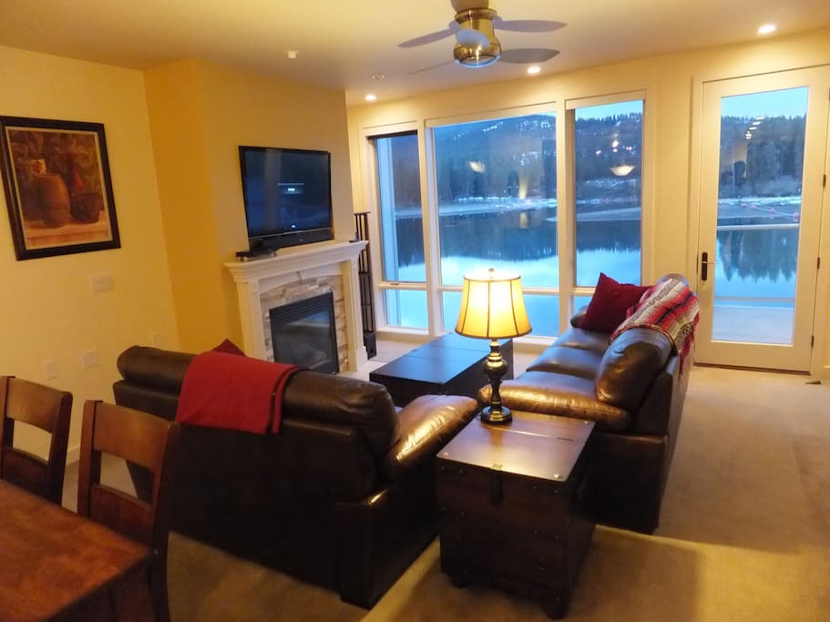 Living room area with HD 48" TV and gas fireplace.