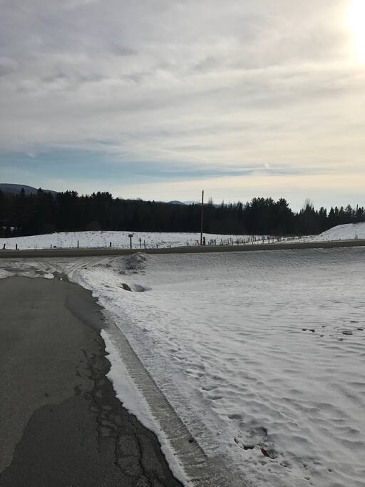 View of mountains and snowmobile trail