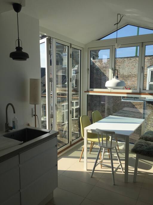 Kitchen with access to private balcony, just in front of the marble church