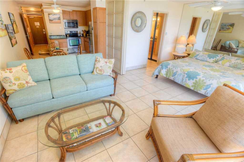 Open Concept Living - Plenty of seating for the family, and a convenient pull-out sofa-sleeper for accompanying children or the o