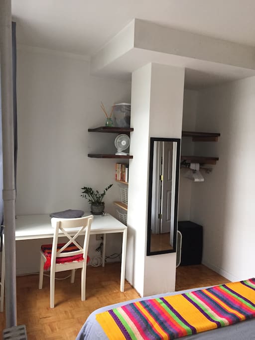 Big desk if you need to work, open closet with lots of hanging & shelf space to make you feel at home :)