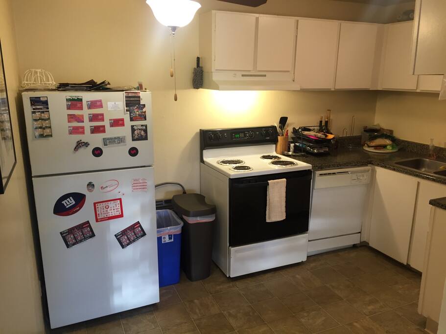 Nice sized kitchen which is fully stocked with all you'd need to cook and ample storage space both in the fridge/freezer and cabinets. Dishwasher, stove, toaster oven, pots & pans, plates, silverware, glasses & mugs, and more.