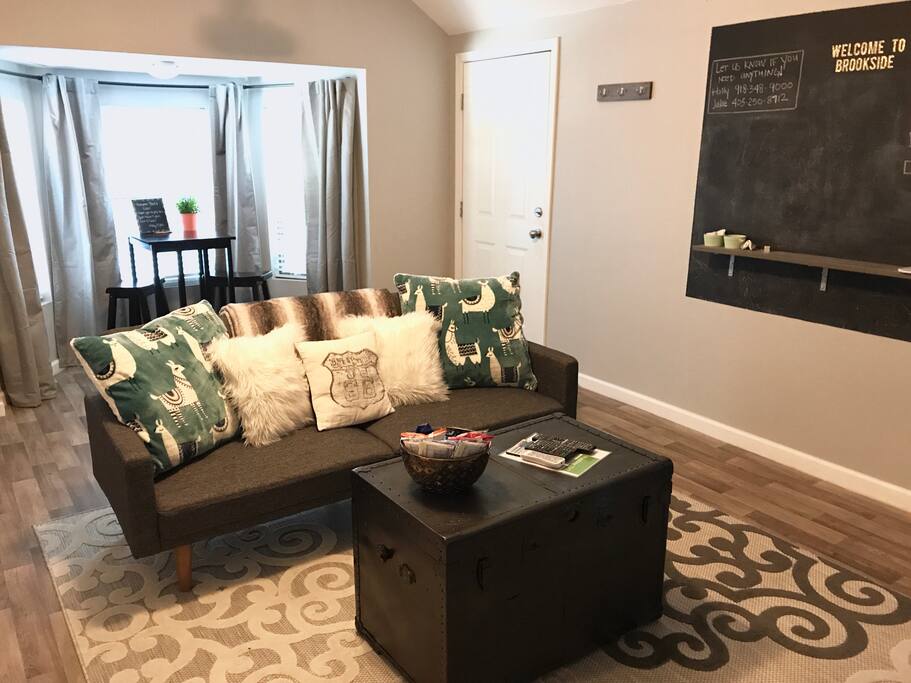Enjoy provided snacks and binge a show on our modern couch. The couch folds down into a full-size bed, and we have sheets and blankets for two extra people to crash on the couch.