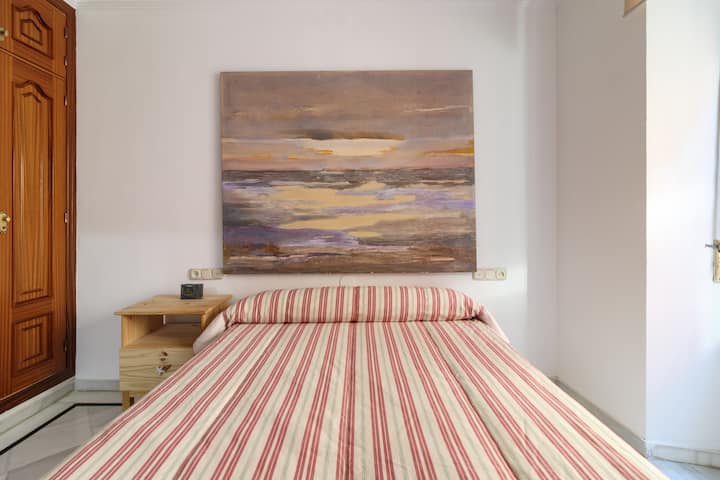 BEDROOM 1: Queen bed 150cm, top quality mattress, closet and bedside table. Air conditioning and heating Travel cot on request and cost of 20 euros additional.