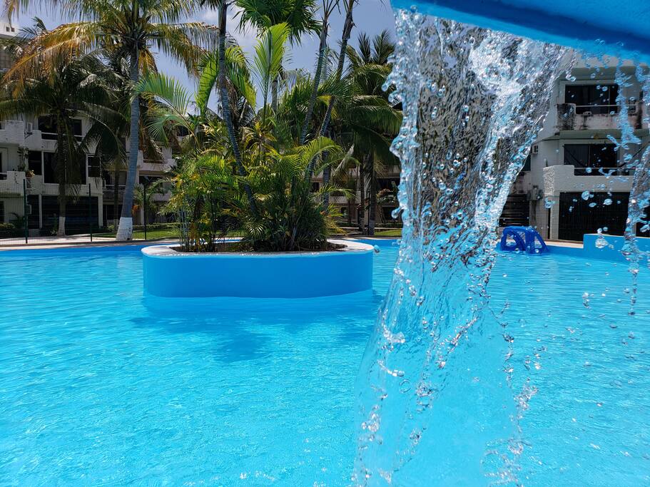 Vista de nuestra alberca, para disfrutar del calor de cancun.