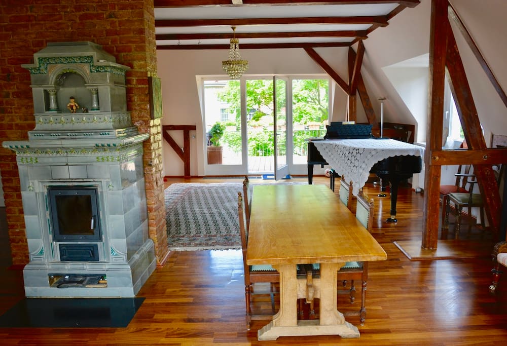 Living room with fireplace (the piano will be gone)