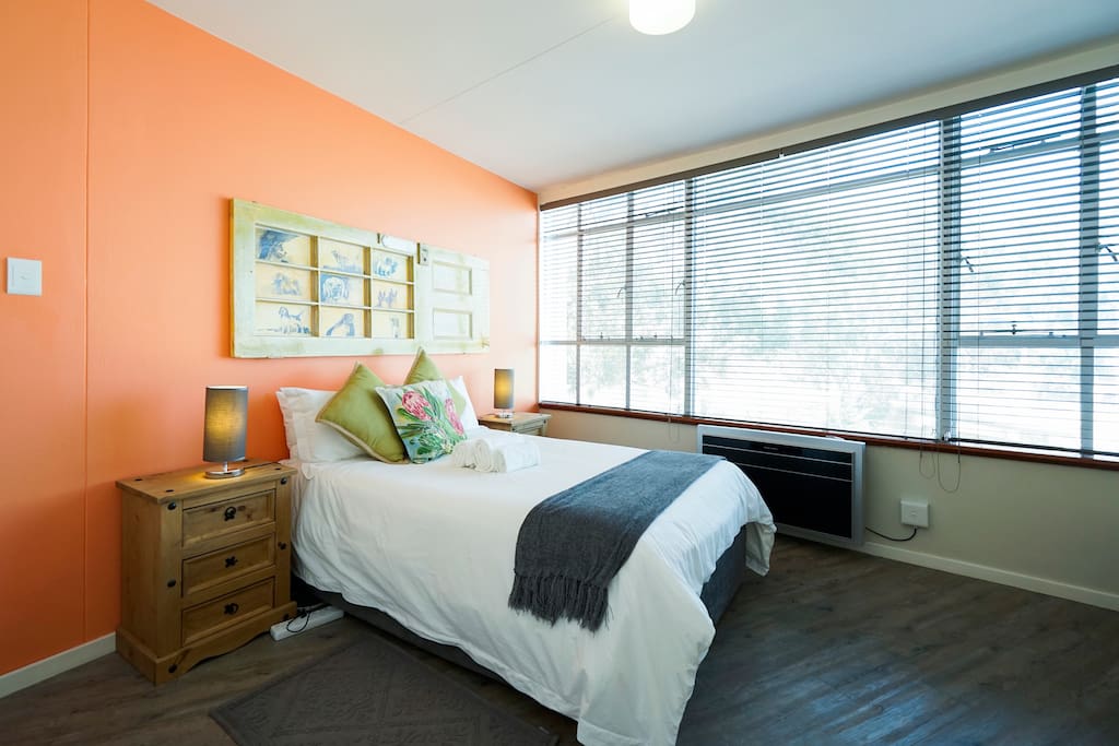 Main bedroom with a great view of Table Mountain. Very comfortable double bed and aircon.