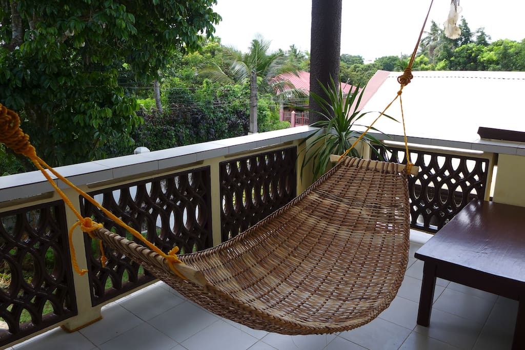 Lounge in our hammock with excellent views of the garden and the trees.