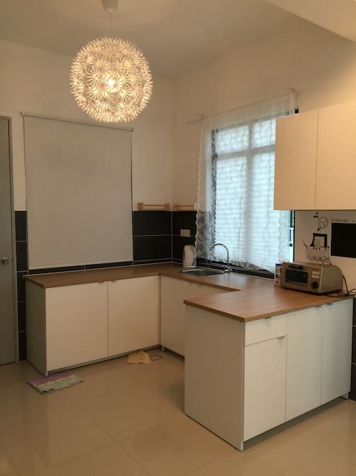 Simple and zen style kitchen with oven , biscuit and water filter