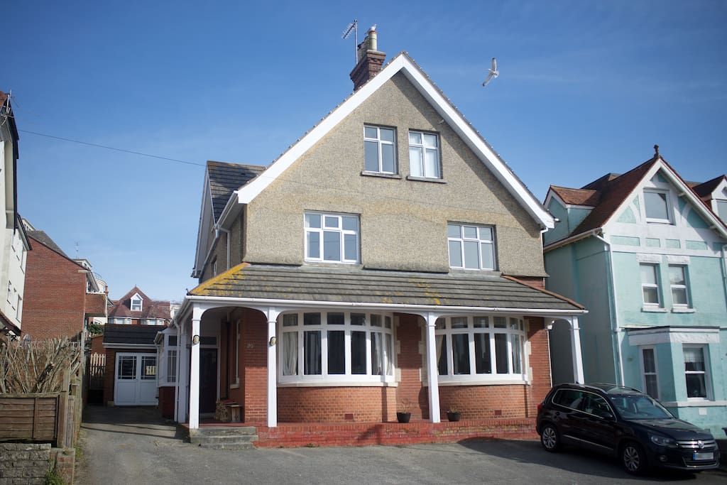 Front of house with parking