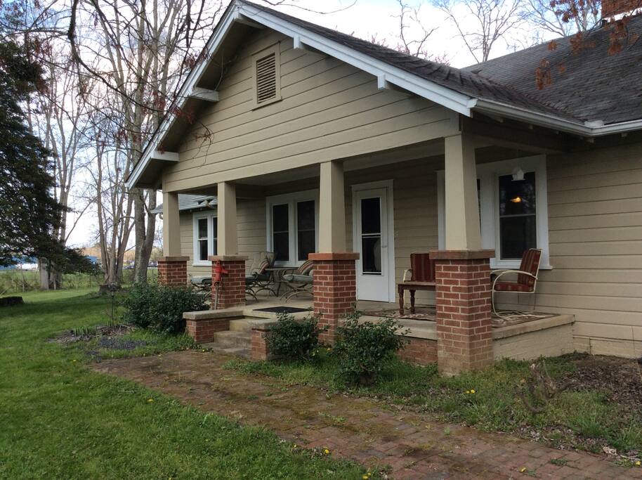 Front porch with plenty of seating.