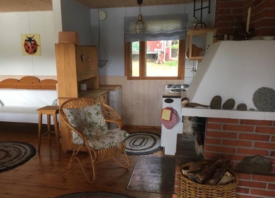 Kitchen and comfy place in front of the fireplace.