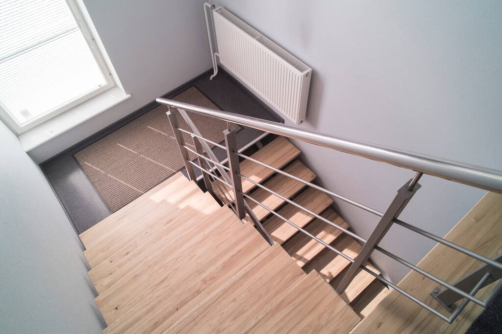 Up the stairs.
