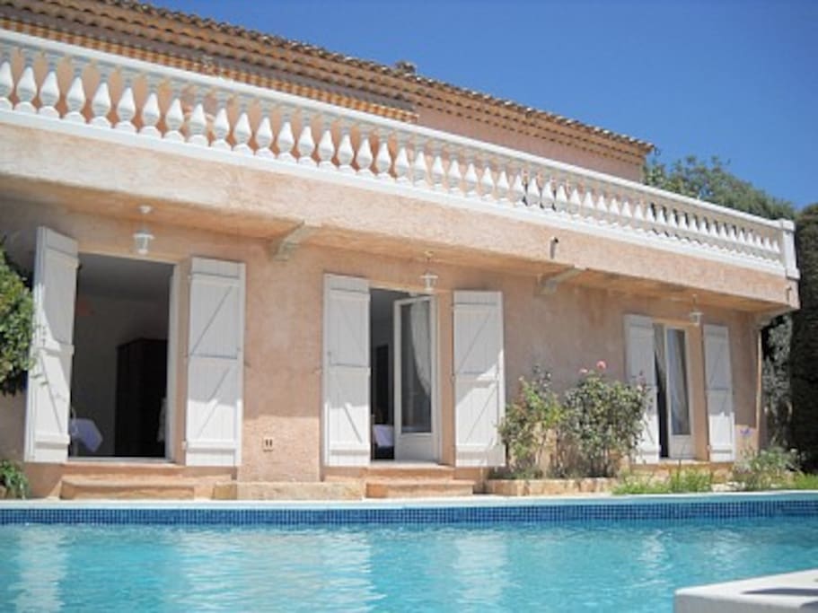 Your feet in the water - the three bedrooms open into the garden