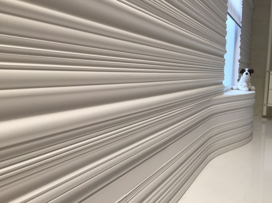 Dramatic molding wall and window ledge.