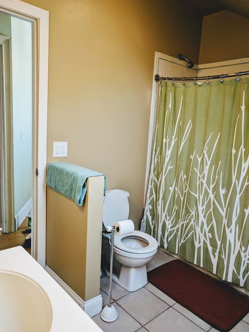 Bathroom shared between two rooms. A half bath available downstairs.