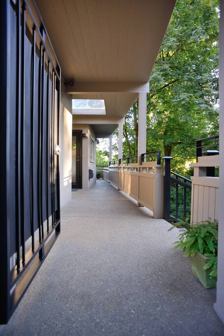 Gated access to lower unit stairs.