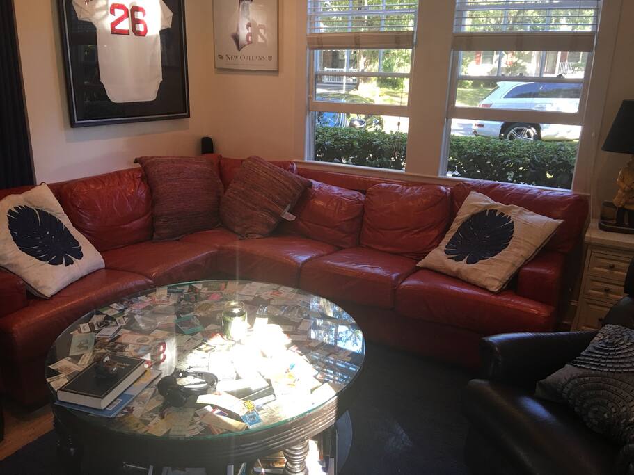 Living room and extra possible sleeping area. Faces 50" TV.