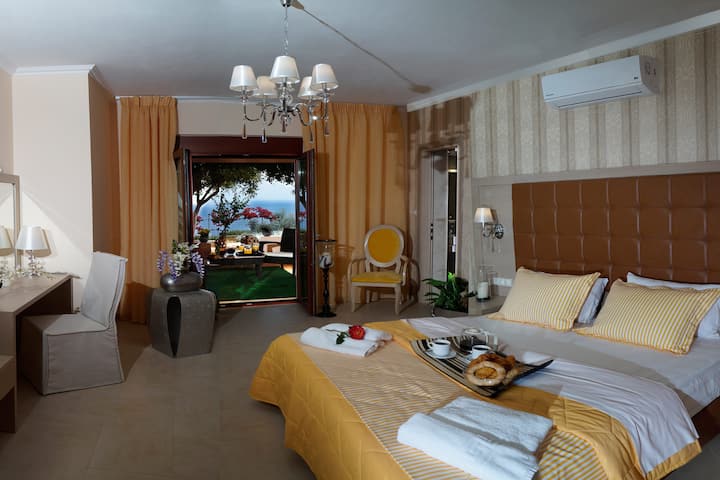 Bedroom with en-suite bathroom on the lower floor and direct outdoor access. 