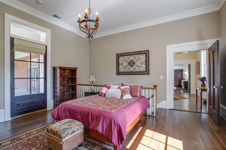 Private room with queen bed.  Staircase leads to living area below with a door that can be closed/locked for complete privacy.