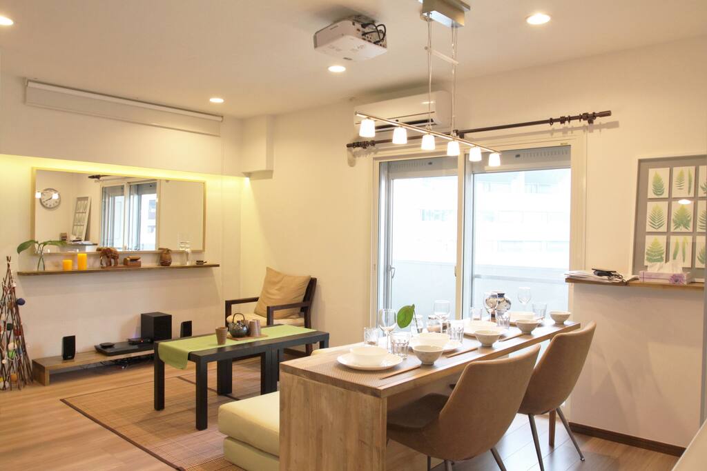 Stylish Living and Dining room with TV Projector and BOSE audio speaker