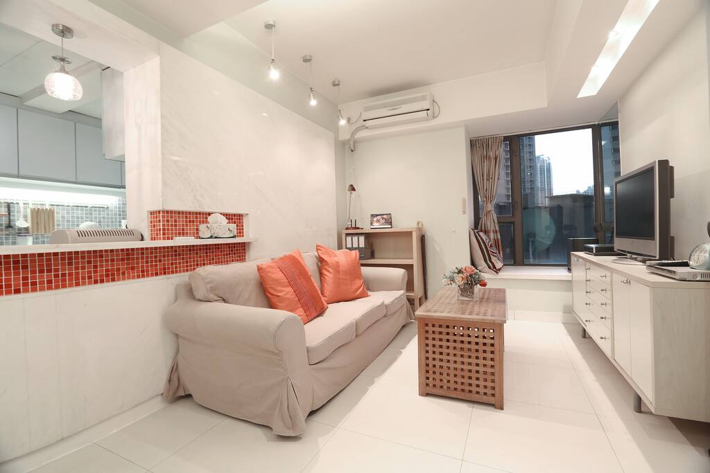 Spacious living room with LED TV with numerous movies and TV series