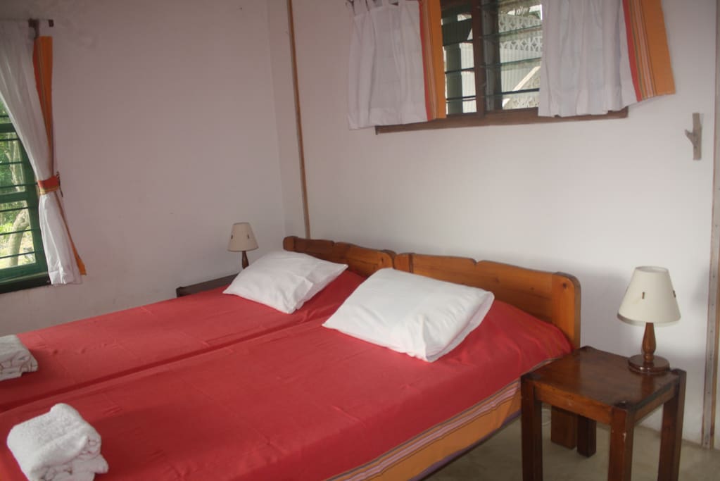 Red themed triple room