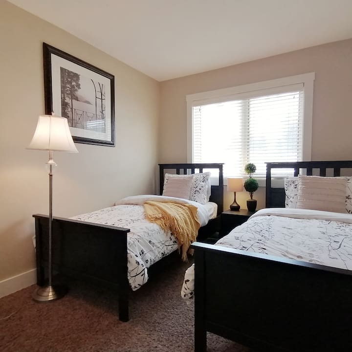 Two twin beds in the second bedroom.