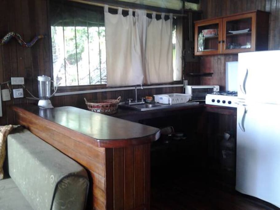 Coffee maker, toaster oven and stove with refridge