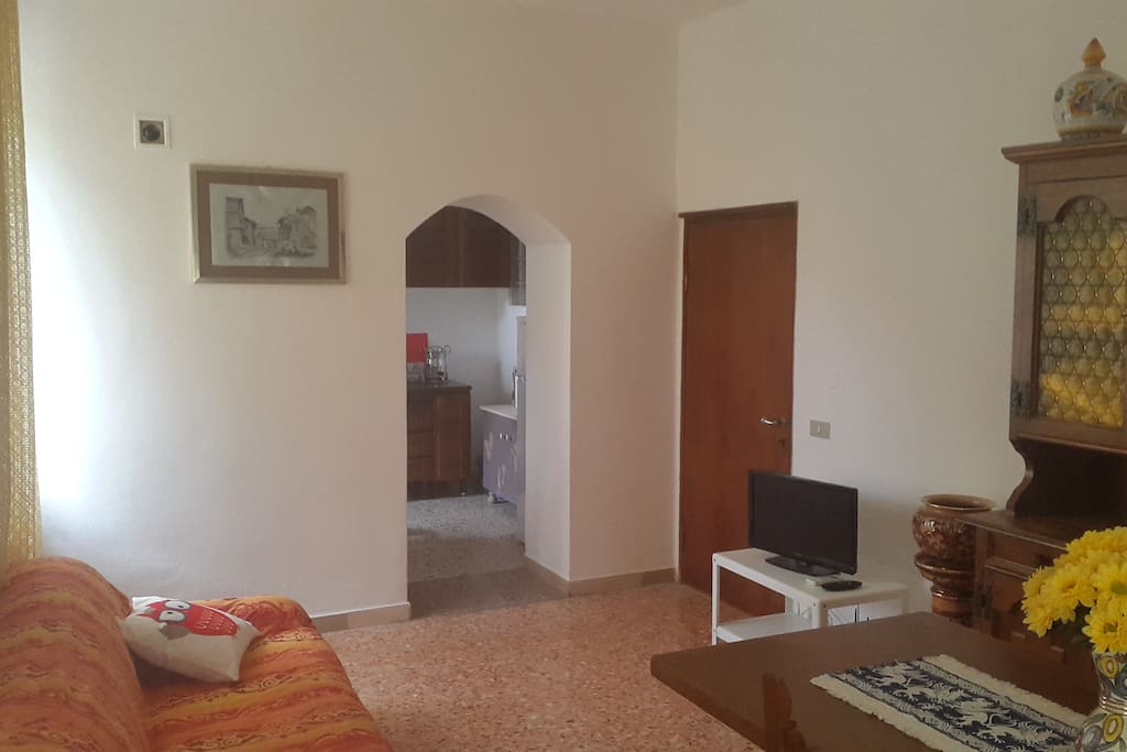Living room with sofa bed and tv