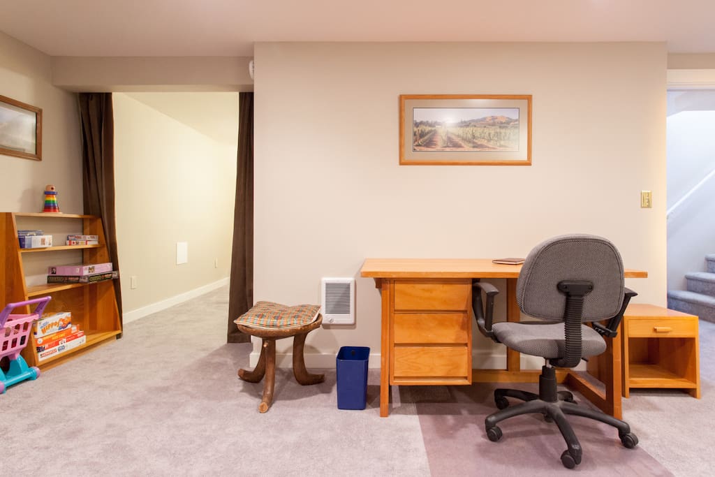 Around the corner and through an arch, the bedroom area can be curtained off or left open.