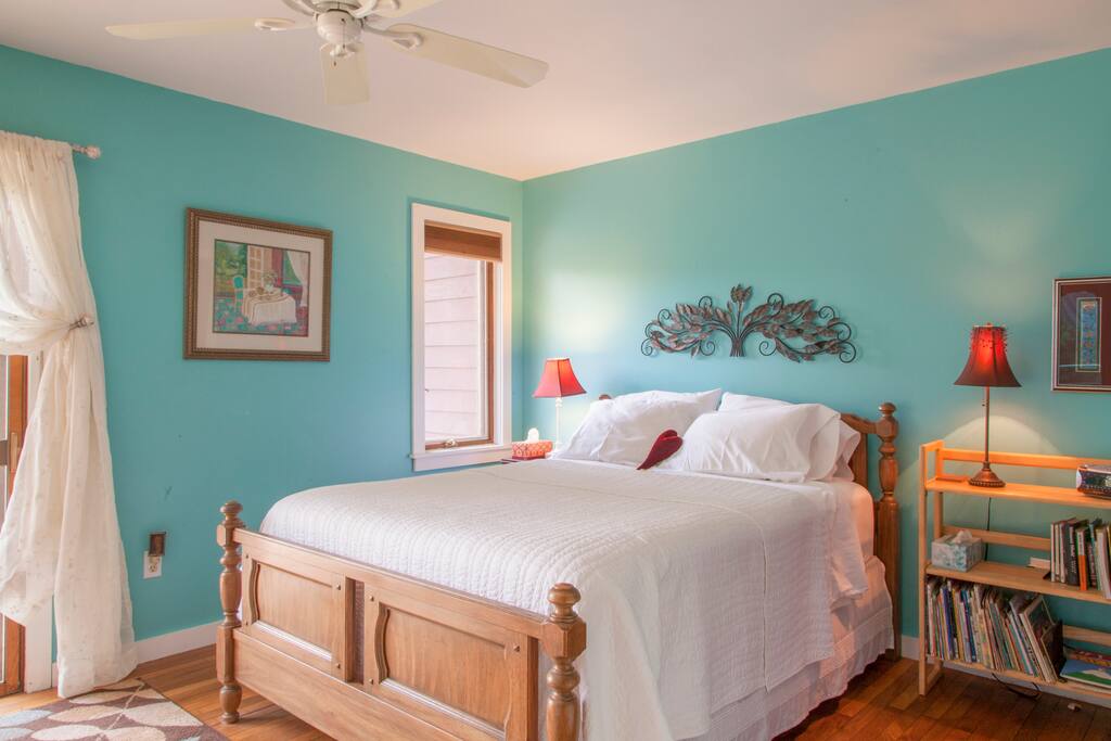 Queen bedroom with slider to deck-1